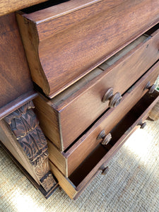 Large Chest of Drawers with Carved Corbels