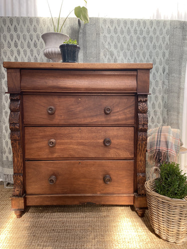 Large Chest of Drawers with Carved Corbels
