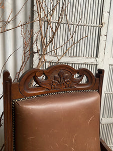 Pair of Antique Carved and Decorative Leather Armchairs