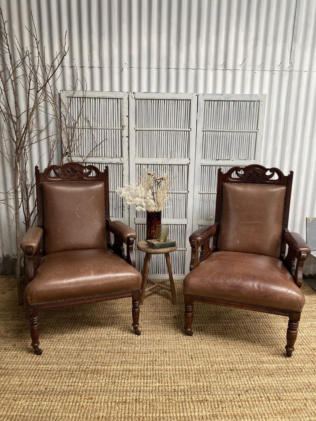 Pair of Antique Carved and Decorative Leather Armchairs